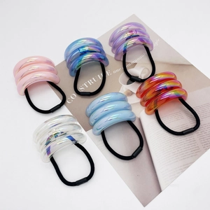 Set of 6 colorful U-shaped elastic hair ties with shimmering iridescent resin accents