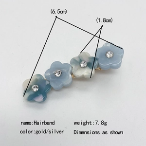 Barrette à cheveux fleurs marbrées bleues avec cristaux et plaqué or pour femme