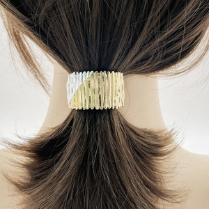 Stylish gold and silver two-tone textured metal ponytail clip for modern women