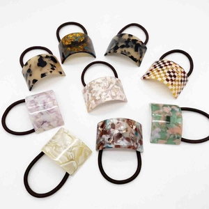 9-piece acetate hair ring set with leopard and marble patterns on elastic bands