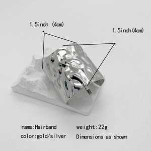 Textured silver hair hook accessory with 4cm diameter and 22g weight for ponytail styling