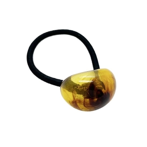 Elastico per capelli nero minimalista con una grande perla in resina ambrata decorata