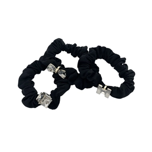 Three-piece black elastic hair scrunchies with elegant crystal butterfly and geometric charms