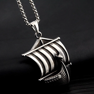 Vintage silver Viking sailboat pendant necklace in stainless steel with a rolo chain