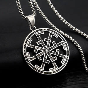 Retro stainless steel Kolovrat sun wheel necklace with oxidized finish and box chain