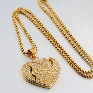 Collier hip hop avec pendentif cœur brisé et signe dollar doré serti de cristaux