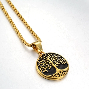 Vintage Tree of Life pendant necklace with gold embossed medallion and black box chain