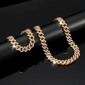 Luxurious gold-tone hip hop jewelry set featuring iced-out cuban link necklace and bracelet