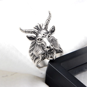 Gothic punk style antelope head ring with spiral horns and pentagram in silver finish