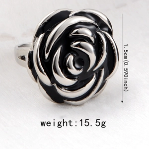 Macro shot of silver rose ring with black enamel petals and 1.5cm diameter detail