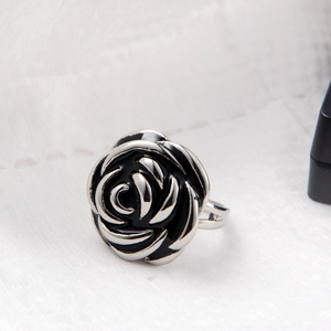Gothic style silver rose ring with black enamel petals on a minimalist metal band