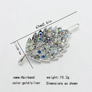 Leaf-shaped alloy hair clip with pavé rhinestones in gold and silver finish