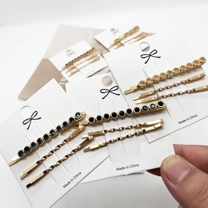 Driedelige haarspeldset met kleurrijke strasstenen en goudkleurige schuifspeldjes