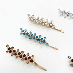 Sparkly rhinestone hair clips set with champagne gold base and colorful crystal gems