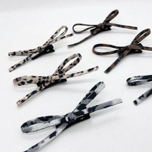 Barrettes à cheveux nœud imprimé léopard de style français en tons marron et gris