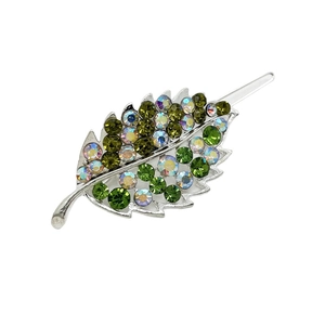 Elegant leaf-shaped silver hair clip with green and AB crystal rhinestones on white background
