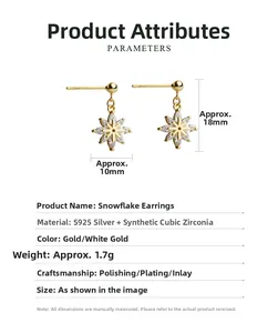 Détail des boucles d'oreilles flocon dorées en argent S925 dimensions 10mm sur 18mm