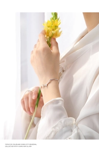 Detail of 925 sterling silver reindeer antler bracelet featuring a sparkling zircon stone