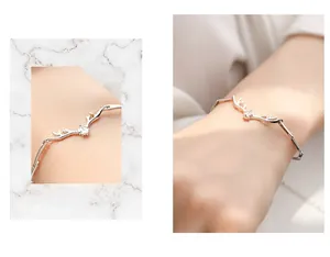 Detail of 925 sterling silver antler bracelet with marquise zircon and bar chain links