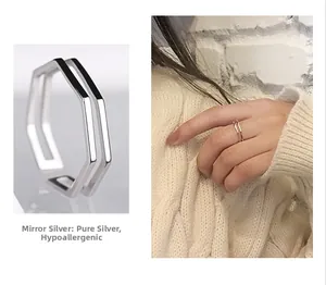 Detailed macro view of 925 silver double-layered hexagonal open ring for women