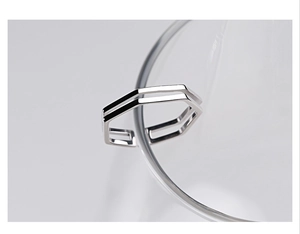 Macro shot of double-layered hexagonal 925 sterling silver ring with open band