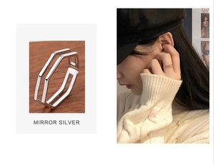 Detailed view of 925 sterling silver double-layer hexagonal open ring in mirror silver finish