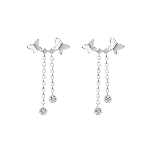Élégantes boucles d'oreilles nœud papillon à pampilles avec fini argent et zircons