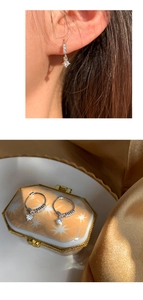 Detailed view of S925 silver micro-paved hoop earrings with zircon pendant drops