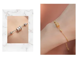 Détail macro du bracelet en argent s925 avec perle cylindrique et chaîne fine dorée et argentée