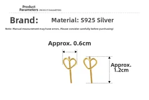 Detail of gold hollow heart earrings in S925 silver with 0.6cm by 1.2cm dimensions