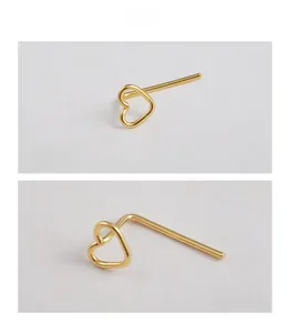 Detailed macro view of gold-plated S925 sterling silver heart-shaped L-bend nose stud