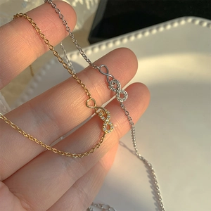 Collier infini en tons or et argent avec chaîne délicate et pavé pour femme