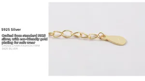 Macro shot of S925 sterling silver stamp on golden cross chain necklace detail