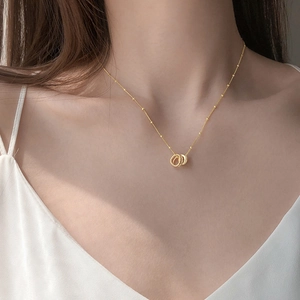 Minimalist gold double interlocking ring necklace for women with delicate bead chain