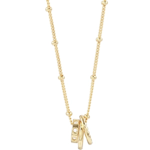 Japanese style minimalist gold necklace featuring three interlocking circles with crystals