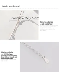 Macro shot of S925 sterling silver cross chain with polished finish and logo tag