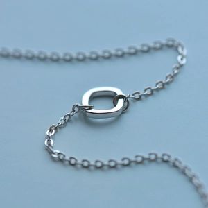 Minimalist silver geometric square charm bracelet with polished metal link chain