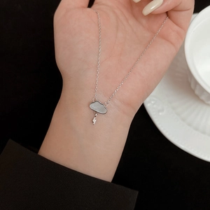 Elegant white mother of pearl cloud and lightning bolt necklace in silver finish