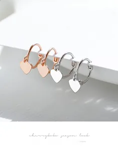 Polished 925 silver heart charm hoop earrings in rose gold and silver finishes