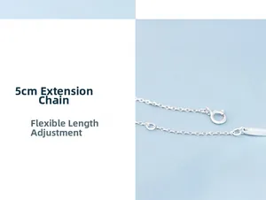 Detailed view of S925 silver cross chain with 5cm extension and spring clasp