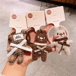 Lot de trois chouchous en tricot avec d'adorables figurines d'ours et de lapins