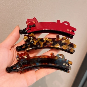 Set di tre graziose mollette a banana a forma di gatto in rosso e tartarugato