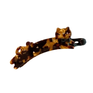 Fermaglio a banana gatto tartarugato con baffi dorati e dettaglio fiocco nero