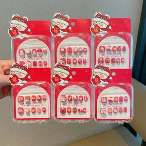 Set de uñas postizas rojas de Año Nuevo con diseños de Sanrio y danza del león infantil