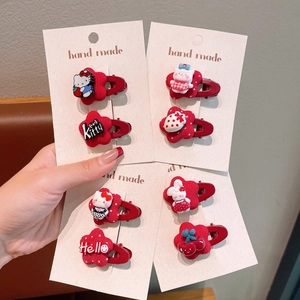 Red 8-piece hair clip set with Hello Kitty, cherry, and rabbit motifs for girls