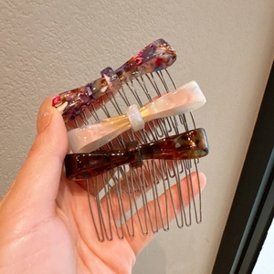 Three-piece set of leopard and floral bow hair combs made of acetate and metal