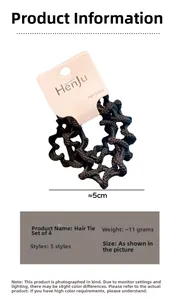 Detail view showing 5cm diameter black wavy hair ties with elastic woven texture in a 4-pack