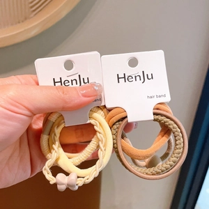 Detail of high-elastic hair tie set with braided texture and bow knot decoration