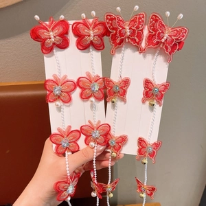 Barrettes à cheveux papillon rouge pour filles avec glands perlés et clochettes
