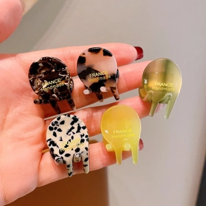 Set of five tortoiseshell and acetate mini hair clips featuring France Handmade logo